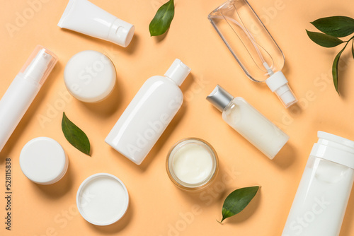 Natural cosmetic products. Serum bottles, cream, tonic and lotion for face and body care. Flat lay image.