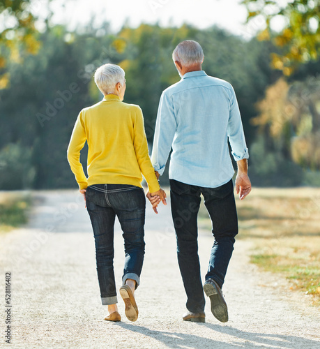 woman man outdoor senior couple retirement together walking love holding hands support old nature wife happiness mature elderly