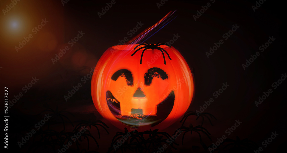 Halloween pumpkin on black background with spiders. Copy Space. Halloween pumpkin on black background with spiders. Copy Space.