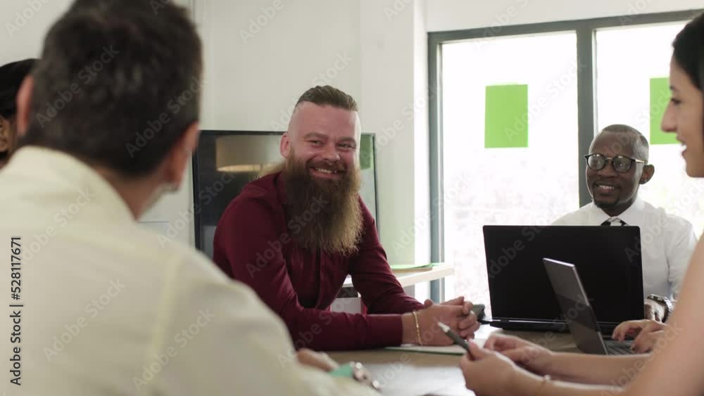 Business people having a creative meeting. Successful multiethnic multiracial colleagues in an office. Business people having a creative meeting. Successful multiethnic multiracial colleagues in an office.