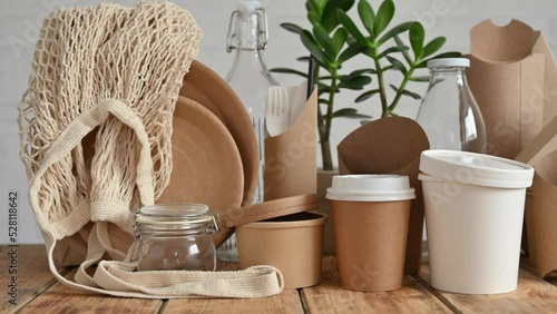 Zero waste concept. Camera movement along eco-friendly paper tableware and packaging made from natural biodegradable materials.