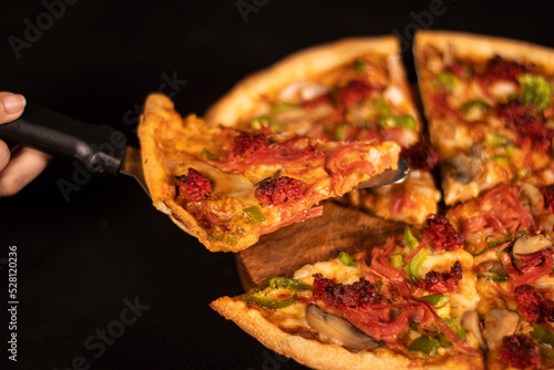 slice of pizza with meat