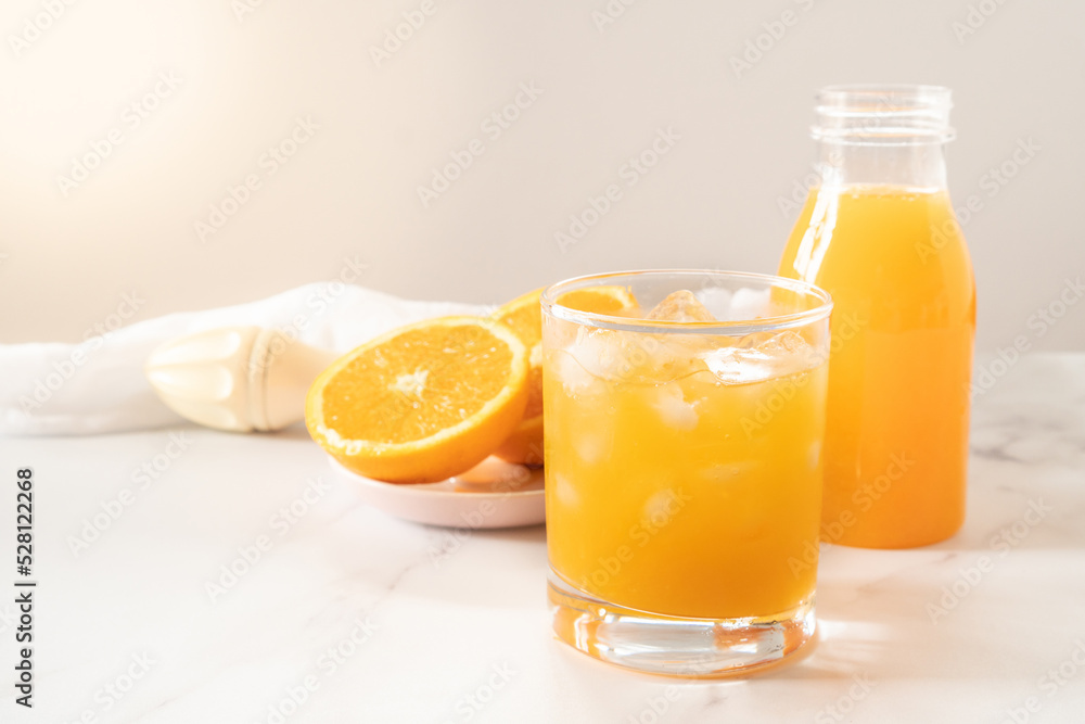 Glass of Freshly Squeezed Orange Juice on a Table Selective Focus with Copy Space Horizontal Glass of Freshly Squeezed Orange Juice on a Table Selective Focus with Copy Space Horizontal