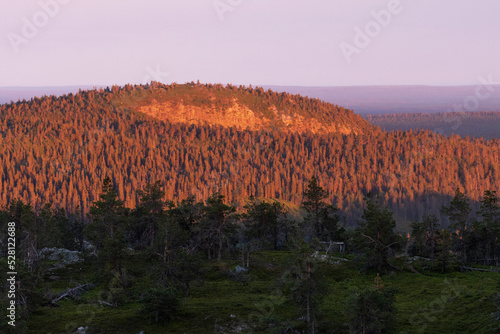 Hillside of Pyhävaara during a beautiful summery sunset near Kuusamo in Northern Finland 