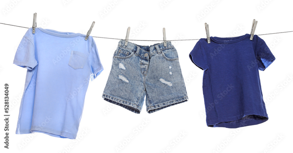 Different clothes drying on washing line against white background Different clothes drying on washing line against white background