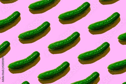 green cucumber pattern on light pink background pop art design