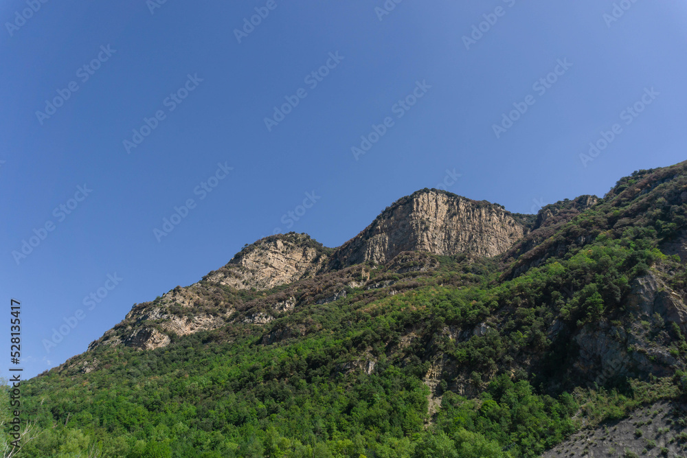 Peak of rocky mountains high in the catalan pyrenees