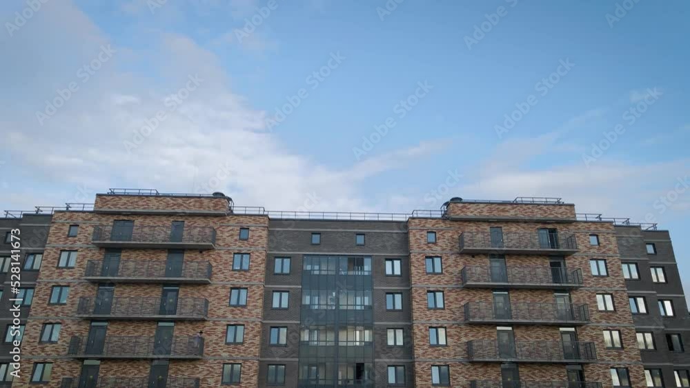 Aerial view of a residential high-rise buildings and constructing more next to park and highway in the historical and at same time modern city of St. Petersburg at sunny summer afternoon close to roof Aerial view of a residential high-rise buildings and constructing more next to park and highway in the historical and at same time modern city of St. Petersburg at sunny summer afternoon close to roof