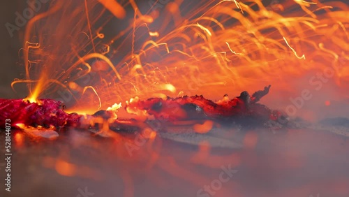 A macro shot of a burning fuse. photo