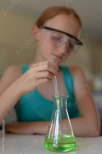 Elementary school girl in chemistry class