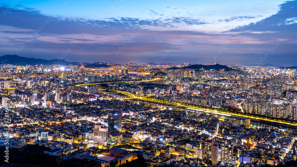 Seoul, South Korea downtown cityscape from above at dusk.