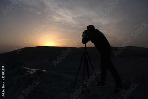 Photographing the sunset on the mountains