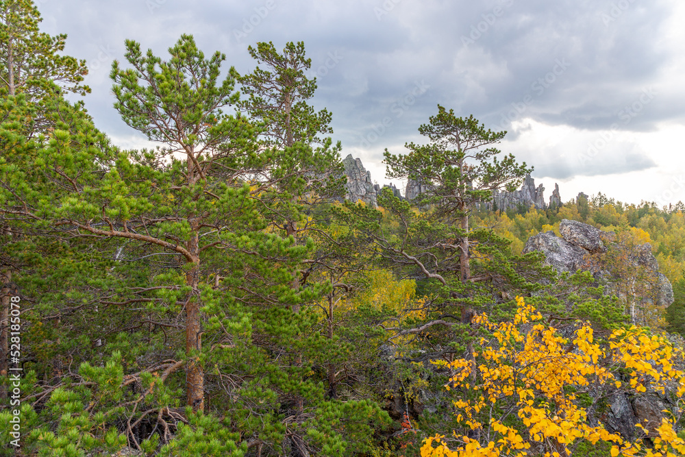 Beautiful view from the Inzer rocks to Ural mountains. Russia, South Ural, Bashkortostan Republic, Beloretsky district, near the Tirlyansky village. Beautiful view from the Inzer rocks to Ural mountains. Russia, South Ural, Bashkortostan Republic, Beloretsky district, near the Tirlyansky village.