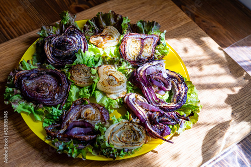 dish with lettuce and fried onions 