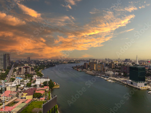 An aerial view capturing the Lagos lagoon as the sun sets in the horizon