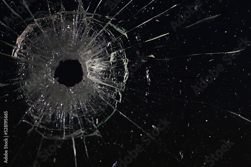 bullet hole on glass black background for overlay, transparent window © kichigin19