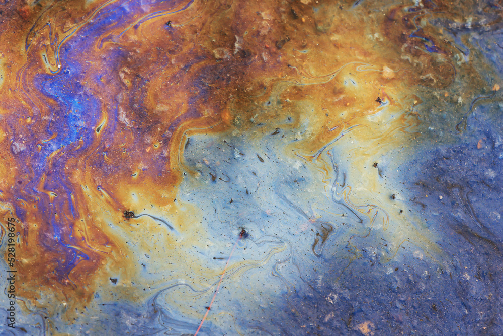 spilled gasoline rainbow background, industrial hazard spill pollution, abstract texture multicolored