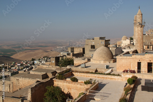 View of Mardin city buildings and Mesopotamian valley in Southeast Anatolia region of Turkey 