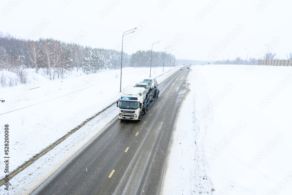 A semi-trailer truck, semitruck, tractor unit and semi-trailer to carry freight. A semi-trailer truck, semitruck, tractor unit and semi-trailer to carry freight.