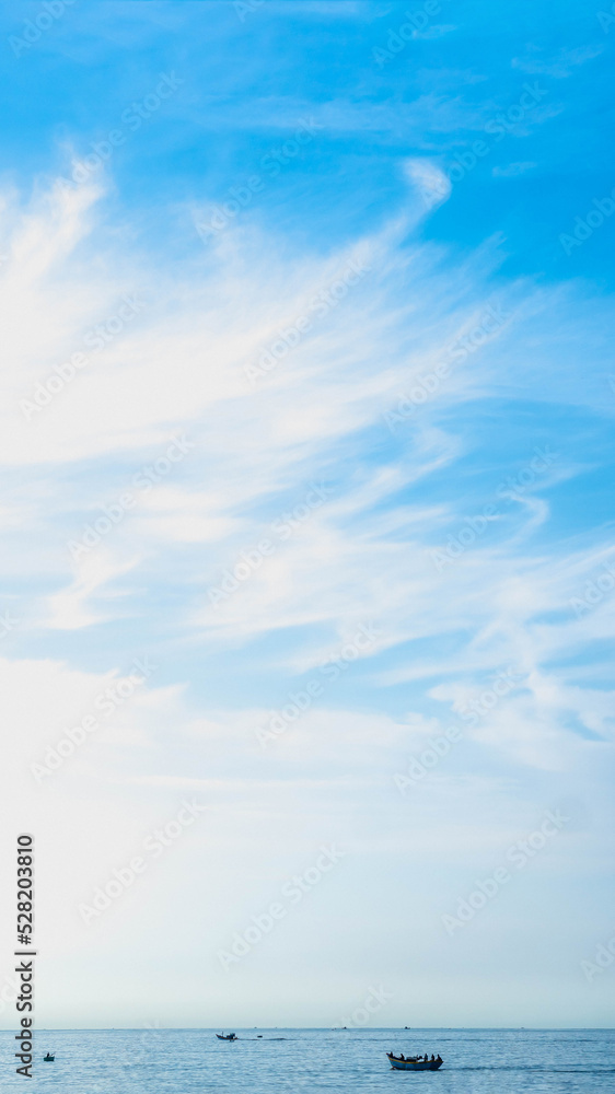 Obraz premium BANNER, VERTICAL STORY Atmosphere panorama white cloud clear blue sky horizon line calm empty sea. Concept paradise life. Design relax wallpaper background. More tone format in stock