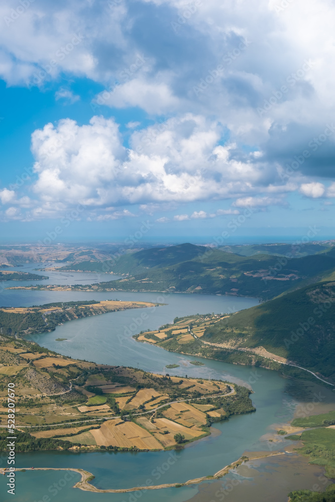 top view of river view through mountains with sky top view of river view through mountains with sky