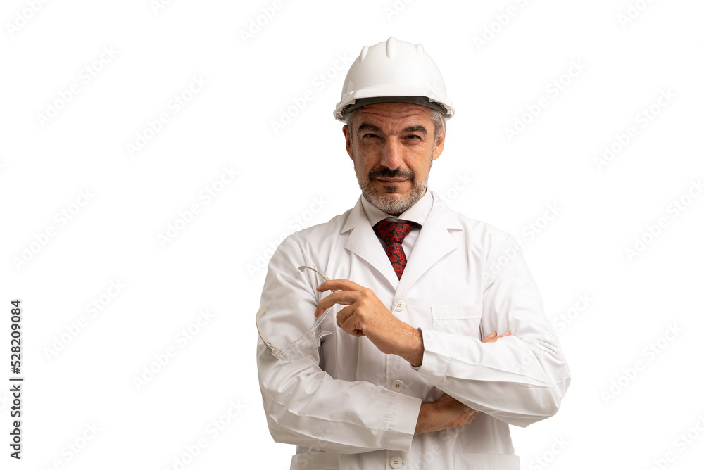 Portrait of a Caucasian engineer / scientist wearing a protective helmet in a white coat, posing with arms crossed and holding safety glasses. isolated on white background. Portrait of a Caucasian engineer / scientist wearing a protective helmet in a white coat, posing with arms crossed and holding safety glasses. isolated on white background.