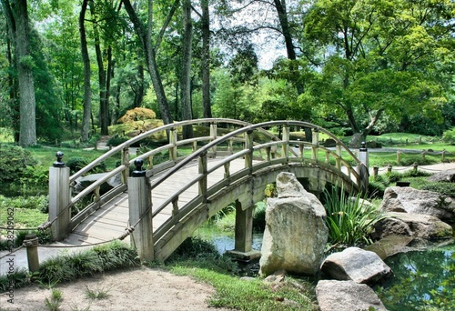 Tableau sur toile wooden bridge in the park