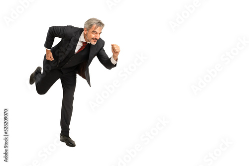 Full length portrait of senior Businessman running in elegant blue suit. isolated on white background with copy space.
