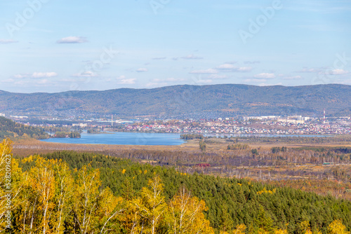 "Sunny valley" ski resort. Autumn landscape from the top of the mountain on Miass city. South Ural, Chelyabinsk region, Russia