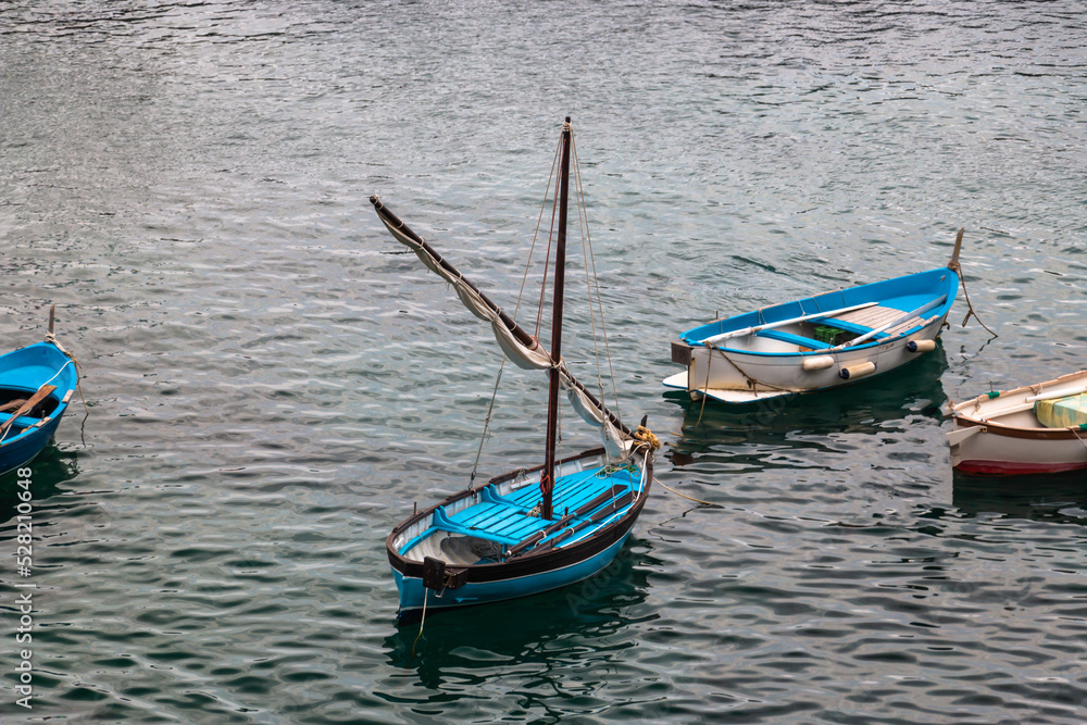Typical Blue sailing boat of Cinque Terre in Liguria, Italy