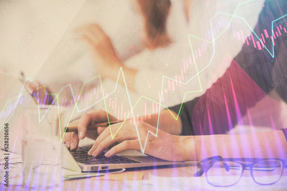 Multi exposure of woman hands typing on computer and financial graph hologram drawing. Stock market analysis concept. Multi exposure of woman hands typing on computer and financial graph hologram drawing. Stock market analysis concept.