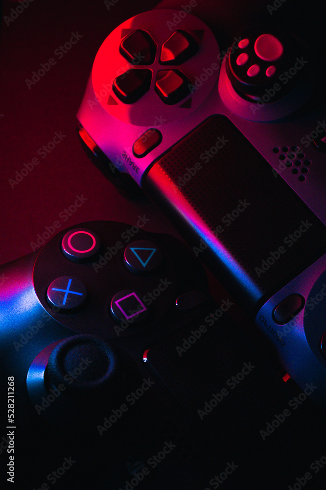 MÁLAGA - SPAIN - FEBRUARY 16, 2020: Playstation 4 Gamepad on black  background with color lights. Sony PS4 Dualshock V2. Studio Shot. Stock  Photo | Adobe Stock