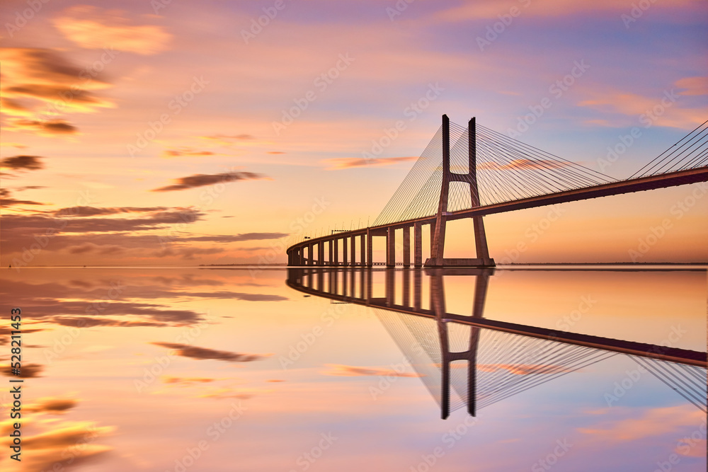 Vasco da Gama Bridge in Lisbona, Portugal, at sunrise Vasco da Gama Bridge in Lisbona, Portugal, at sunrise