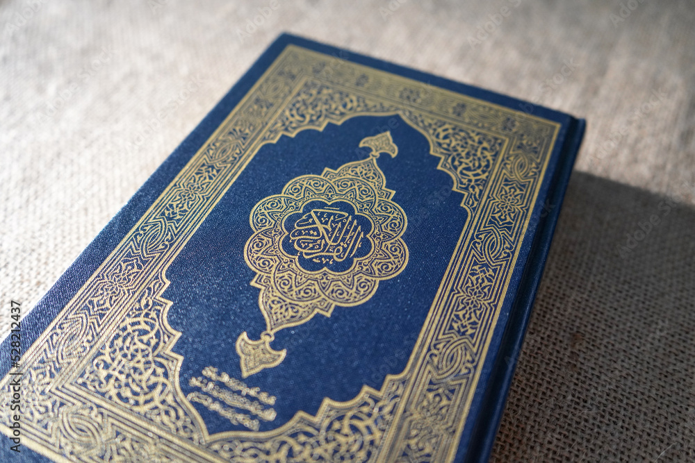Fototapeta premium The Quran, also romanized Qur'an or Koran, is the central religious text of Islam, believed by Muslims to be a revelation from God (Allah).It is widely regarded as the finest work in classical Arabic