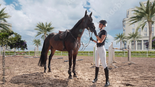 Equestrian sport - a young girl with her horse.