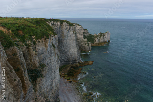 The cliff of Falaise d'Amont on a summer day in Etretat, Normandy, France