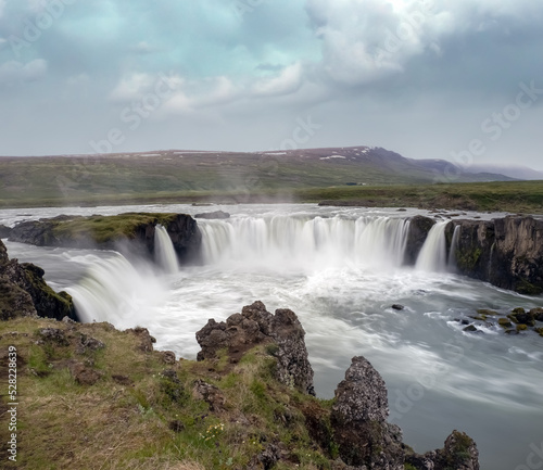 Goðafoss waterfall in northern Iceland, located along the country's main ring road. The water of the river Skjálfandafljót falls from a height of 12 metres over a width of 30 metres.