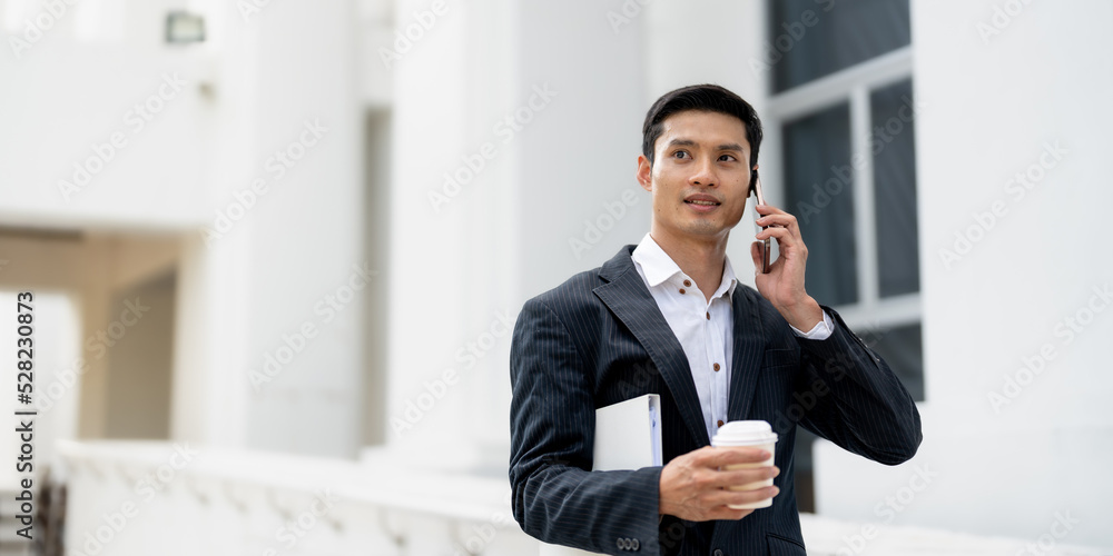 Handsome Asian businessman calling on smartphone. close up. Handsome Asian businessman calling on smartphone. close up.