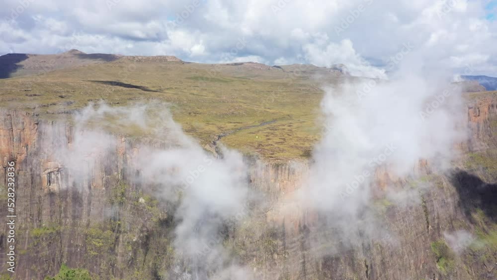 Aerial view of Drakensberg cliff covered by clouds, Royal Natal National park, South Africa Aerial view of Drakensberg cliff covered by clouds, Royal Natal National park, South Africa