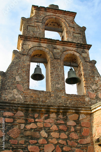 Bell tower of the Jesuit Estancia de Caroya founded by the Society of Jesus in 1616. Colonia Caroya, Córdoba, Argentina. Rural establishment and church. Colonial structure  photo