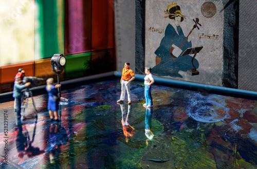 Television shooting scene of a movie by miniature people.