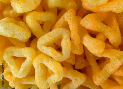 yellow corn triangles with cheese flavor. Beer snacks