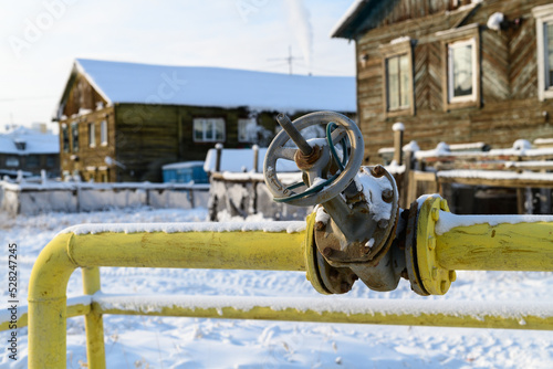 Gas pipeline and gas tap in Siberia, Russia photo