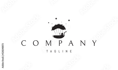 Vector logo on which an abstract image of a cat with a spyglass flying on an airship made of sausage.