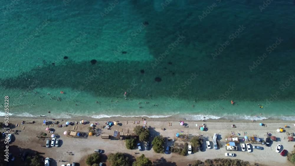 aerial view, sea and unofficial beach, with cars on the shore, azure sea, milli park near the city of Kusadasi aerial view, sea and unofficial beach, with cars on the shore, azure sea, milli park near the city of Kusadasi