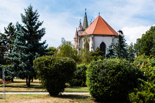 Sebes Lutheran fortified church seen from the City Hall park. Romania. photo