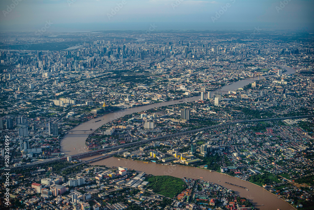 An aerial view of Bangkok and the winding Chao Phraya River. Bangkok, Thailand