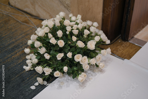 multi color flower arrangement for wedding ceremony or holy matrimony indoors isolated flowers photo