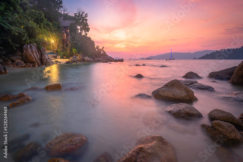 The sea on the beach  along the rocks  watching the sunset before dusk  inKoh Lipe Thailand 