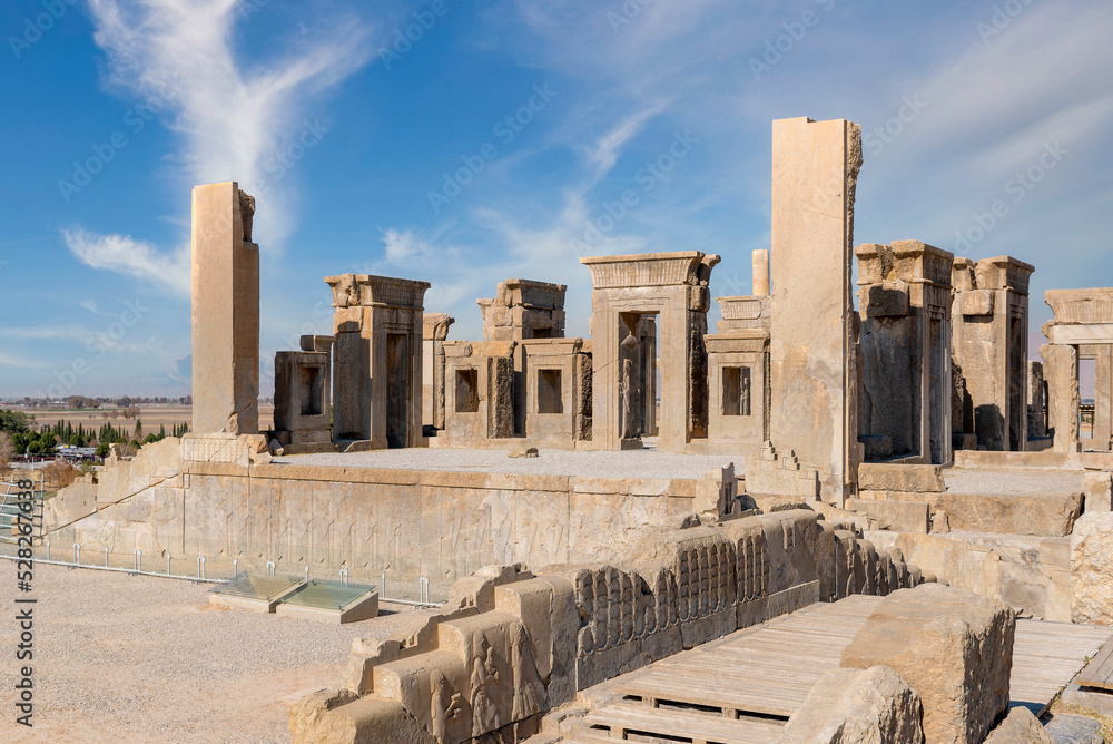 Sunrise in Persepolis, capital of the ancient Achaemenid kingdom. ancient columns. View of Iran. ancient persia. beautiful cloud background